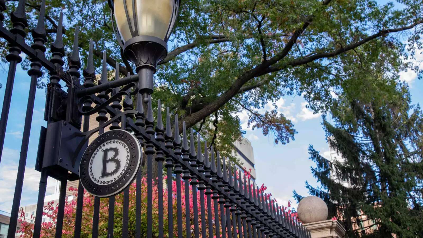 Barnard campus gates with the Barnard "B" sign